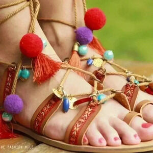 like new: Boho Summer hippie sandals with ropes and pompoms tie-up size 9